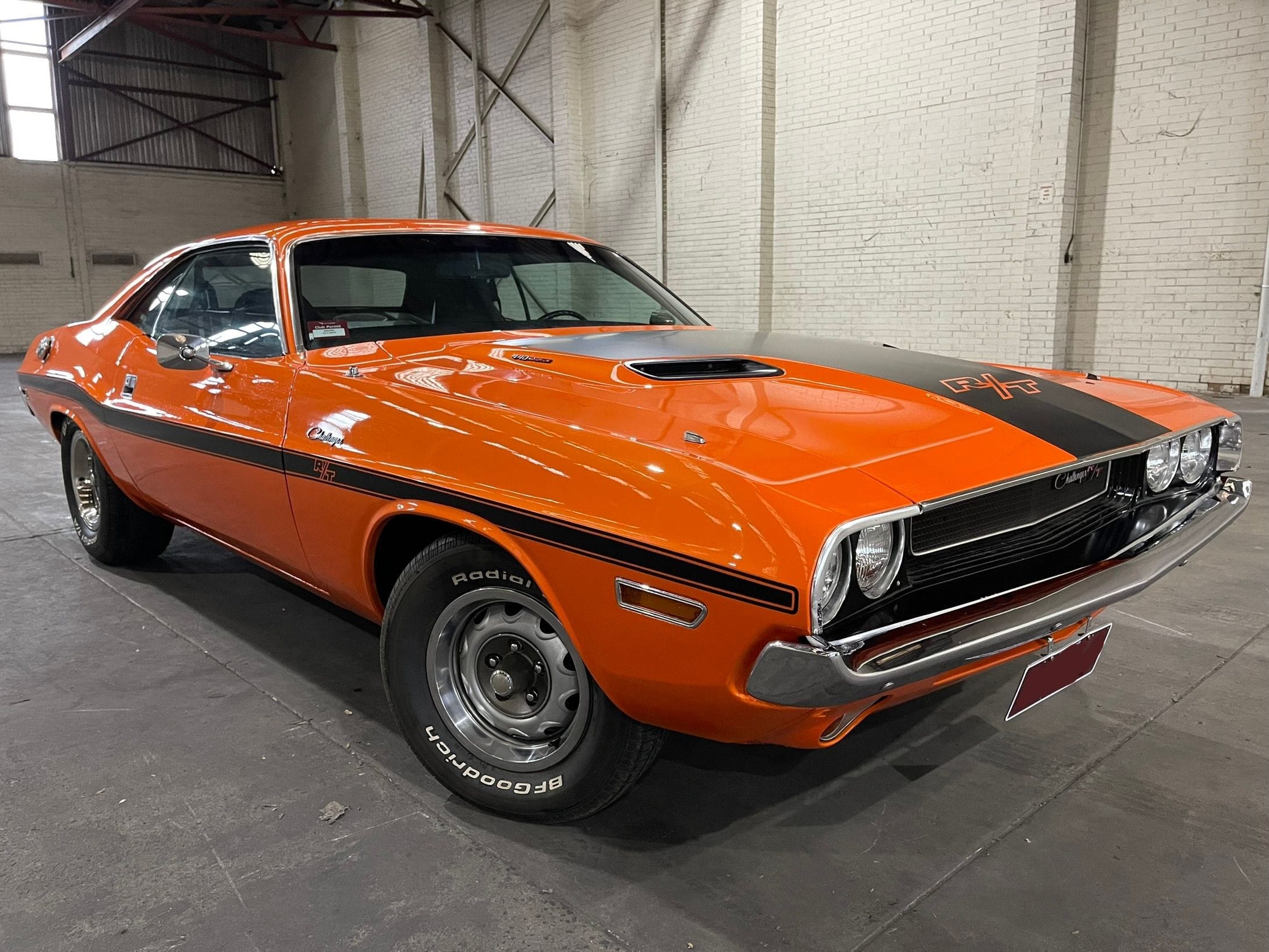 Red 1970 Dodge Charger with Radial BF Goodrich tyres.